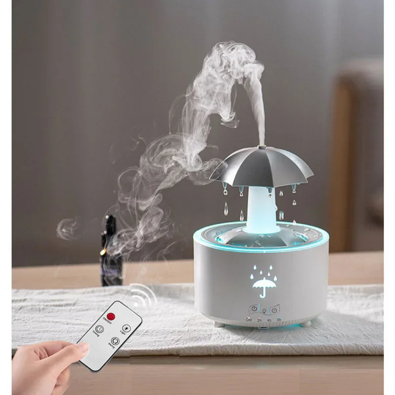 Máquina de aromaterapia con forma de paraguas giratorio y gotas de agua