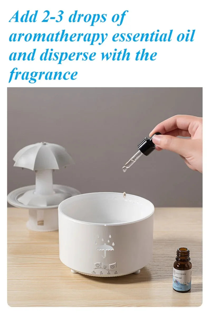 Máquina de aromaterapia con forma de paraguas giratorio y gotas de agua