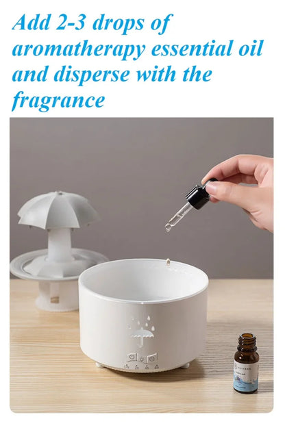 Máquina de aromaterapia con forma de paraguas giratorio y gotas de agua