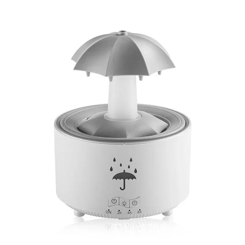 Máquina de aromaterapia con forma de paraguas giratorio y gotas de agua
