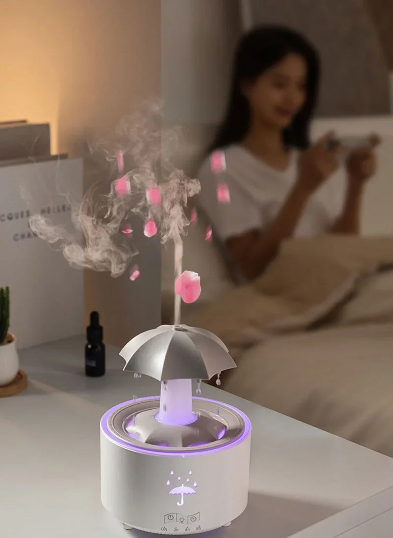 Máquina de aromaterapia con forma de paraguas giratorio y gotas de agua